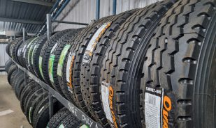 Rack full of Car Tyres - Tyre Repairs & Replacements - Taylored Automotive